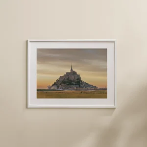 Mont Saint Michel Sunset print depicting the ancient abbey, set against a pastel sky at sunset