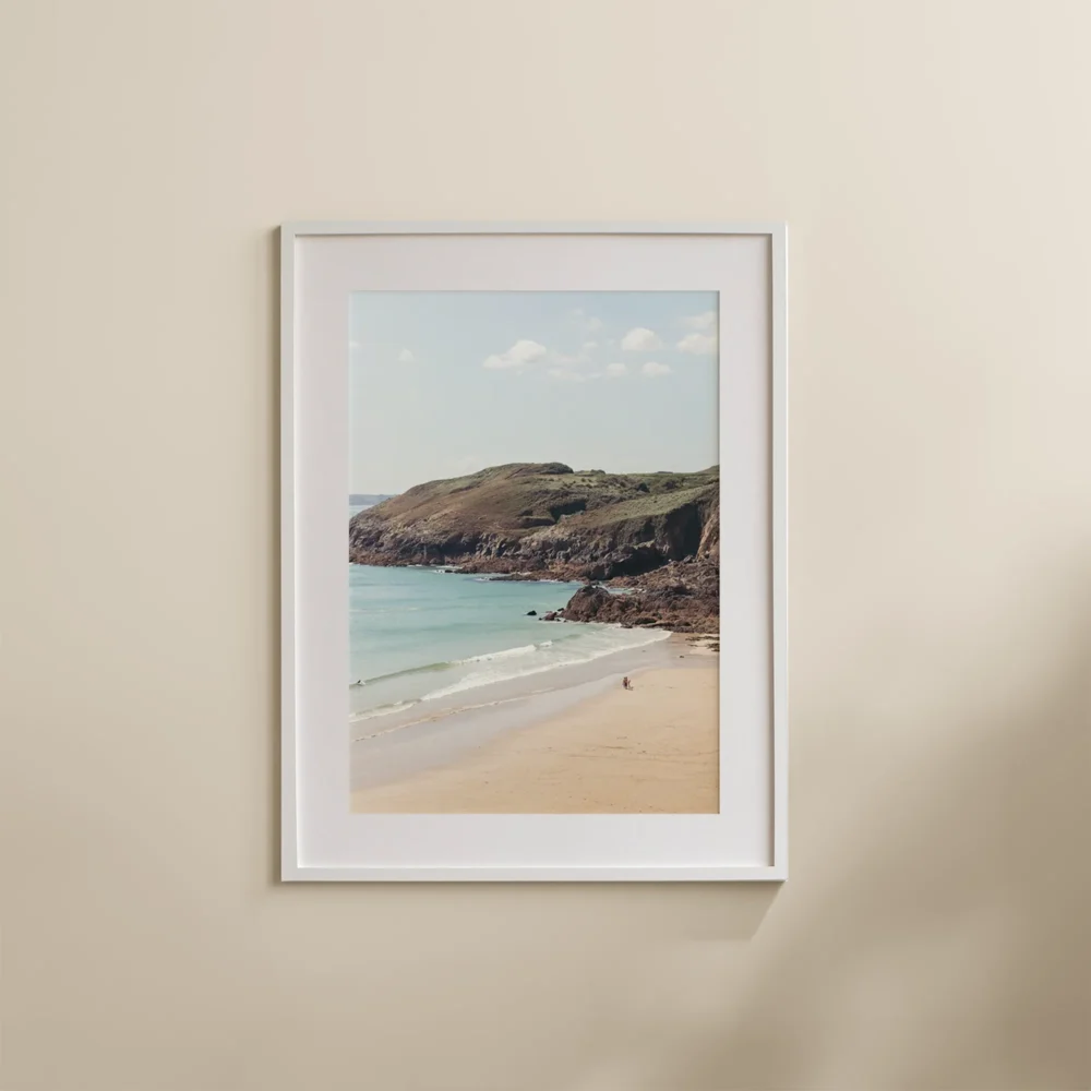 Plage du Minou French Beach print depicting the rugged French coast. Soft golden sands meet the sparkling blue waters while a family takes a walk on the beach.