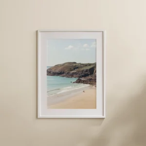 Plage du Minou French Beach print depicting the rugged French coast. Soft golden sands meet the sparkling blue waters while a family takes a walk on the beach.